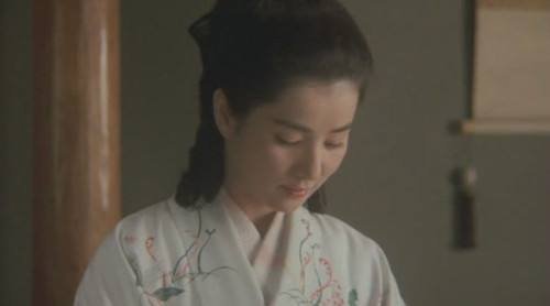 “最是那一低头的温柔，似一朵水莲花，不胜凉风的娇羞”是徐志摩哪首诗里面的？