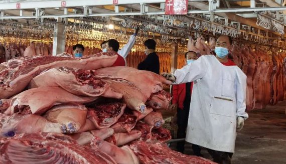 新发地猪肉批发大厅已经开始复试，是否代表新发地市场已经恢复正常？