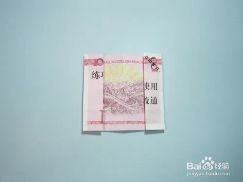 简单的手工折纸天使 用钱折纸爱心天使步骤图解