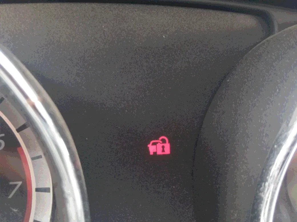 仪表盘显示一辆车被一把锁锁上指示灯是什么意思