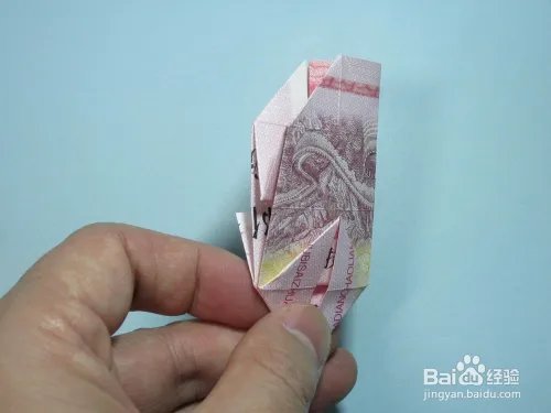 简单的手工折纸天使 用钱折纸爱心天使步骤图解