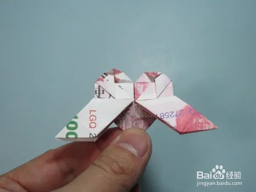简单的手工折纸天使 用钱折纸爱心天使步骤图解