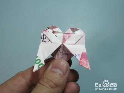 简单的手工折纸天使 用钱折纸爱心天使步骤图解