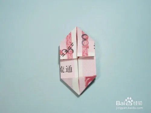 简单的手工折纸天使 用钱折纸爱心天使步骤图解