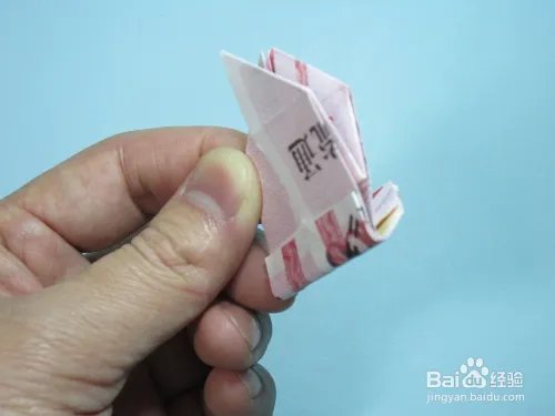 简单的手工折纸天使 用钱折纸爱心天使步骤图解