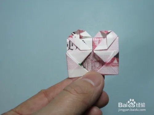 简单的手工折纸天使 用钱折纸爱心天使步骤图解