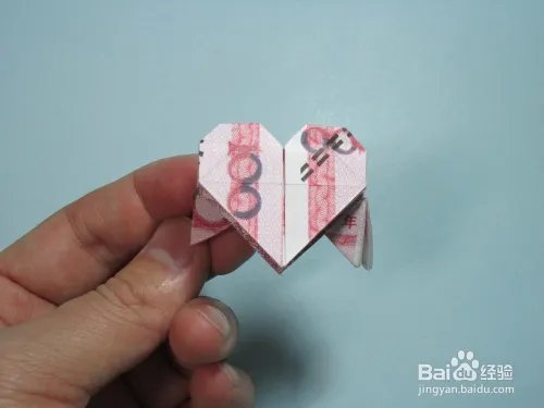 简单的手工折纸天使 用钱折纸爱心天使步骤图解
